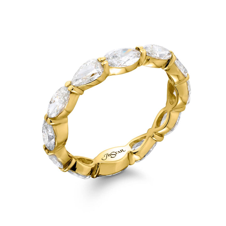Alluring Eternity: Our stunning 2.40 ctw. East-West Diamond Eternity Band. These beautiful marquise oval and pear-shaped diamonds are handcrafted in 14K yellow gold.