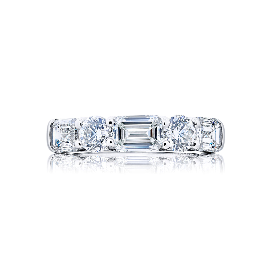 Elegance Elevated: Our signature 2.78 ctw. East-West Diamond Band. These beautiful emerald-cut diamonds blended with dazzling round diamonds are handcrafted in pure platinum.