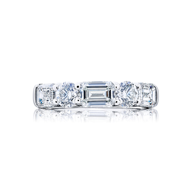 Elegance Elevated: Our signature 2.78 ctw. East-West Diamond Band. These beautiful emerald-cut diamonds blended with dazzling round diamonds are handcrafted in pure platinum.