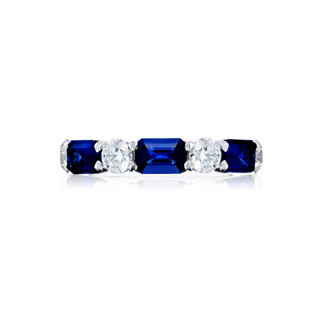 Elegance Elevated: Our signature East-West Sapphire and Diamond Band. These beautiful emerald-cut sapphires blend with round diamonds and are handcrafted in pure platinum.