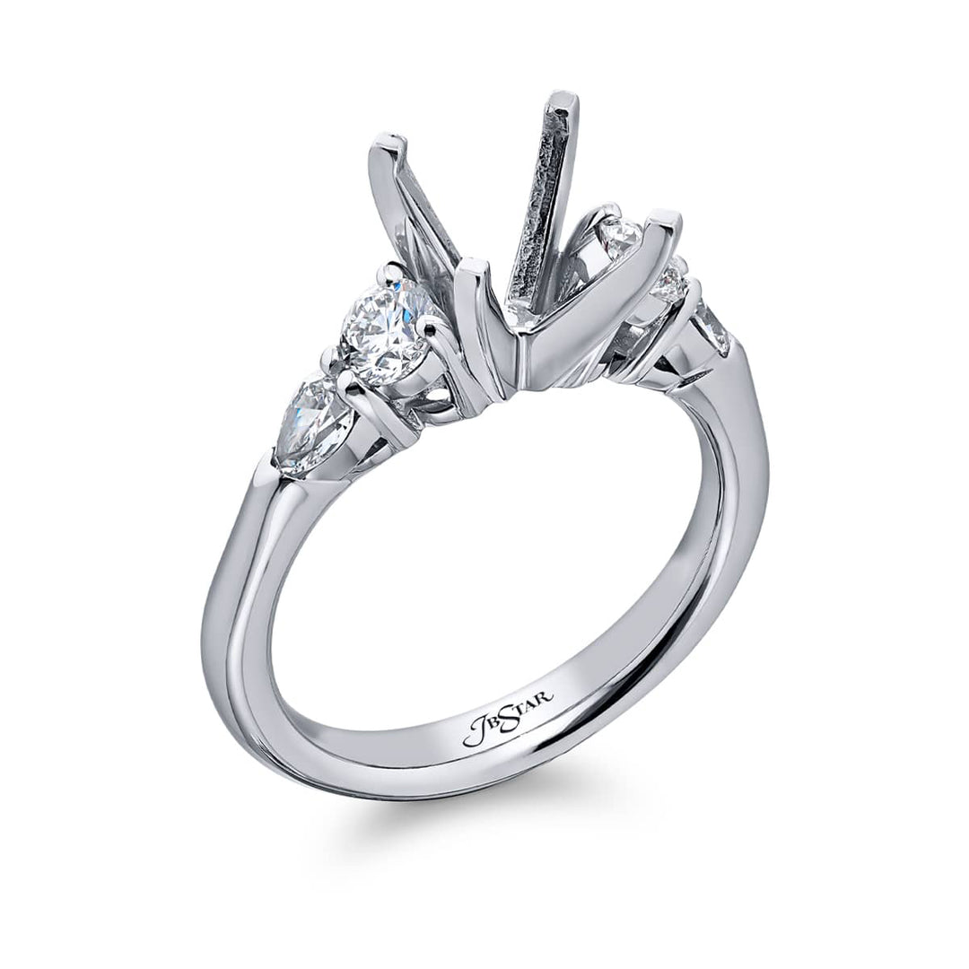 Dazzling Brilliance: Our stunning Diamond Semi-mount. These two round diamonds accompanied by two pear-shaped diamonds are handcrafted in pure platinum.