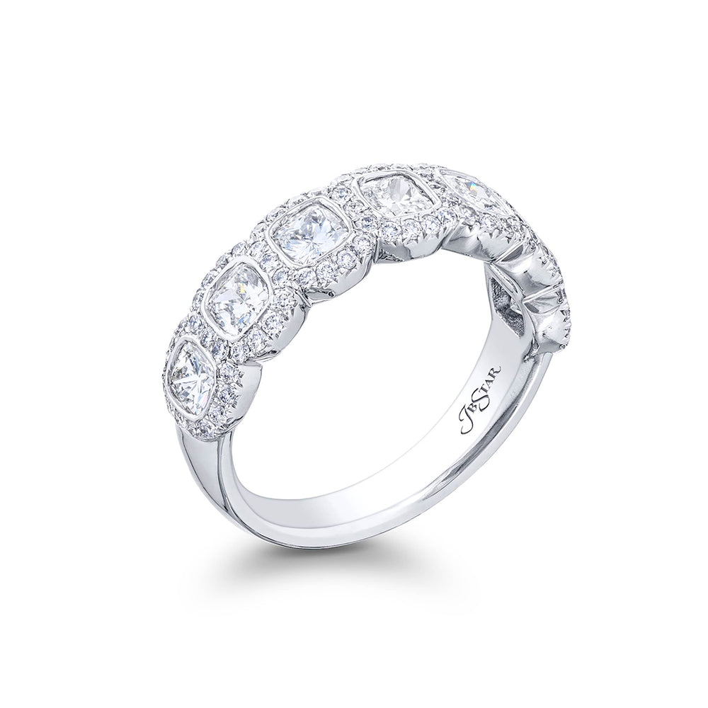 Elegance Elevated: Our signature Bezel Diamond Band. These seven gorgeous cushion-cut diamonds embraced by micro pave diamonds are handcrafted in pure platinum.
