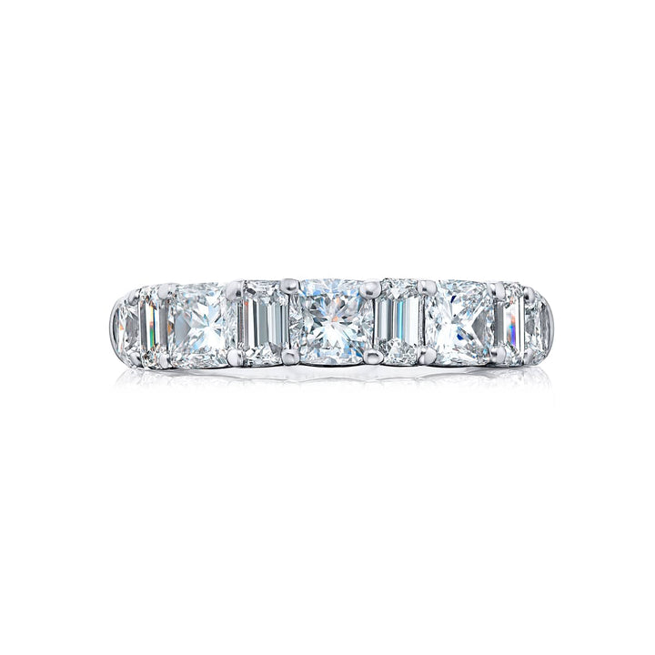 Elegance Elevated: Our stunning 3.38 ctw. Diamond Band. These stunning cushion-cut diamonds flanked by dazzling emerald-cut diamonds are handcrafted in pure platinum.