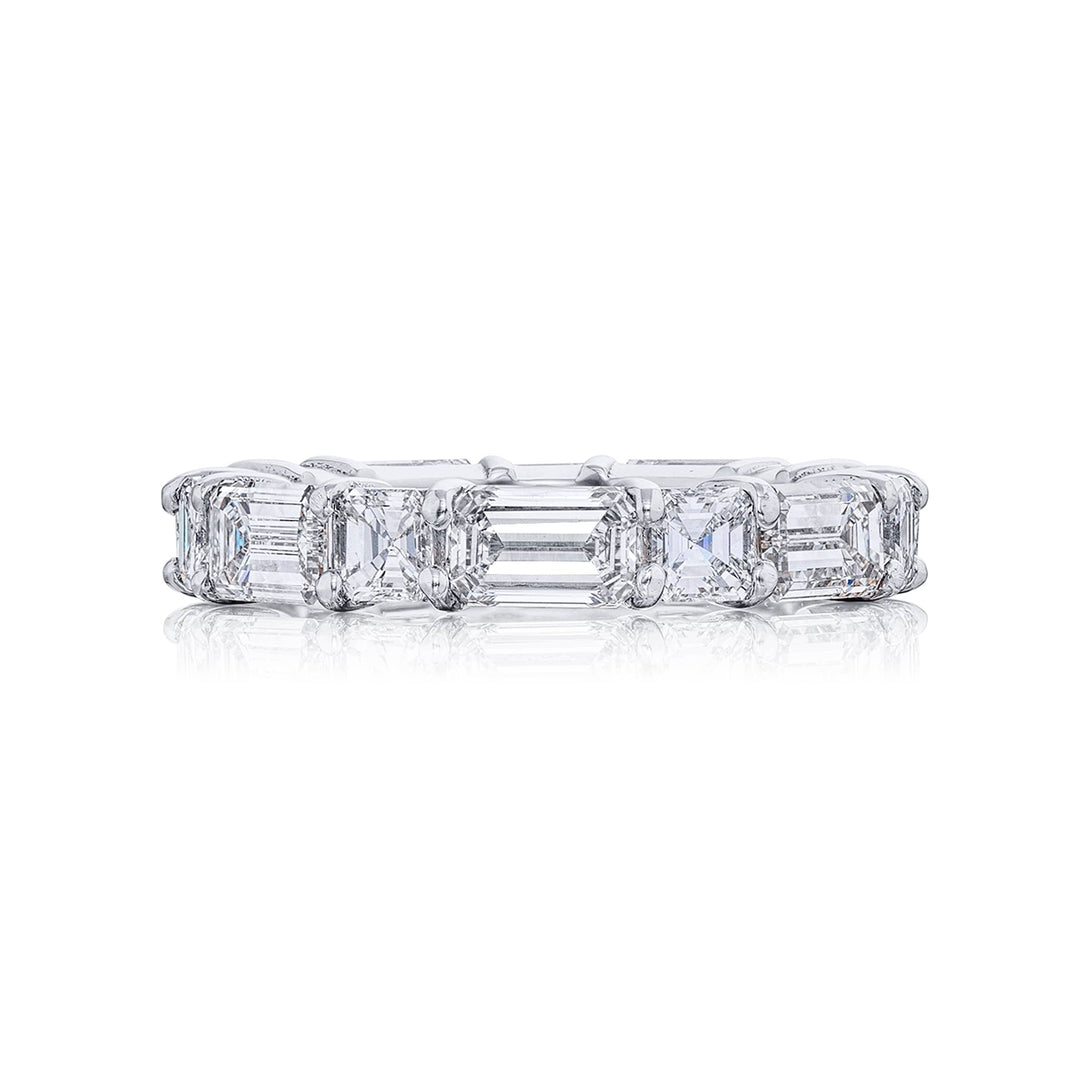 Alluring Eternity: Our stunning single row East-West Diamond Eternity Band. These fourteen square emerald-cut and emerald-cut diamonds are handcrafted in pure platinum.