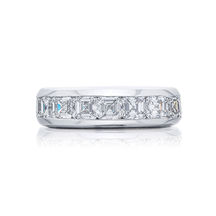 Suave Sophistication: Our debonair Channel Set Diamond Gentleman?s Band. These eleven gorgeous square emerald-cut diamonds are handcrafted in pure platinum.