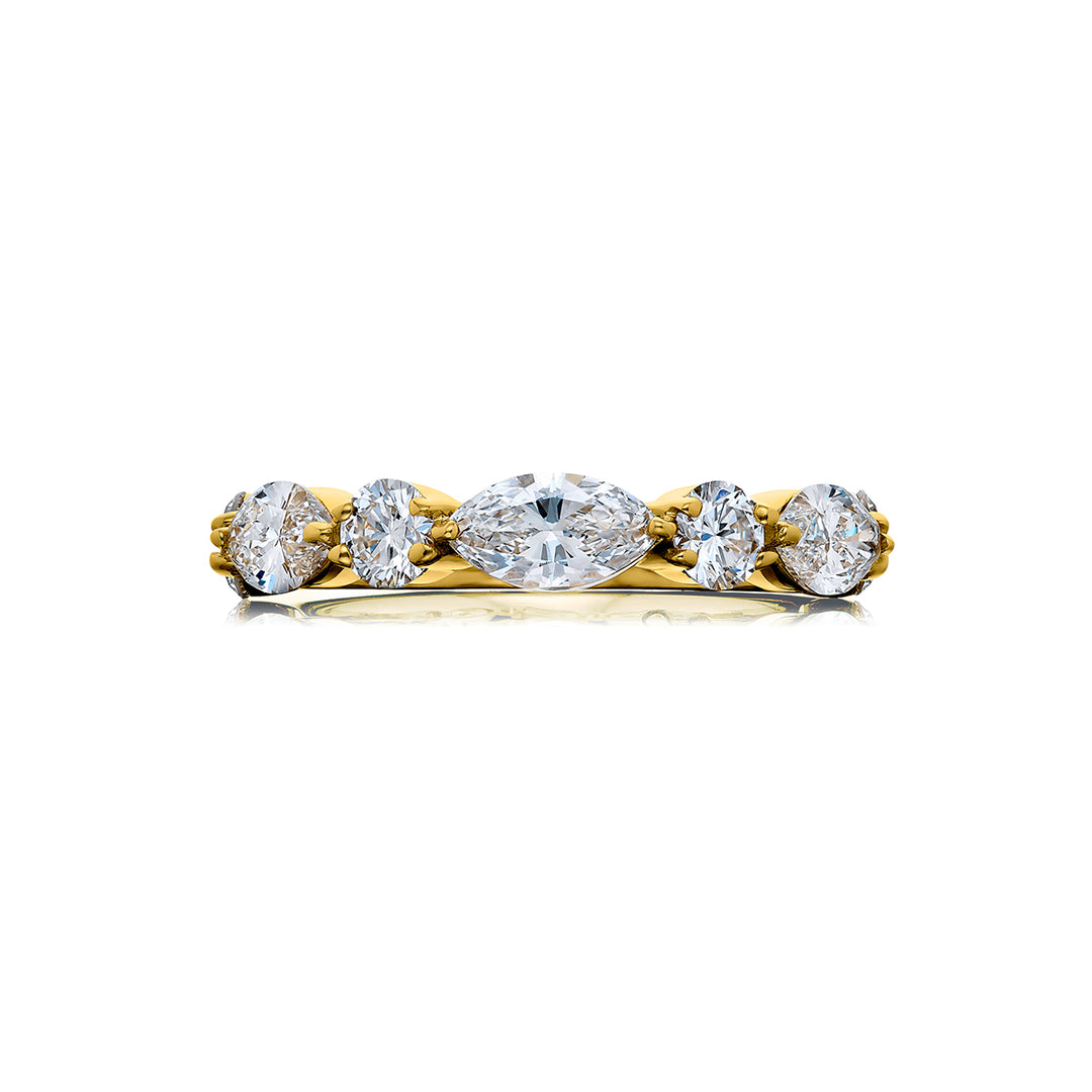 Elegance Elevated: Our classic single row East-West Diamond Band. These beautiful round and marquise diamonds are handcrafted in 18KY gold.
