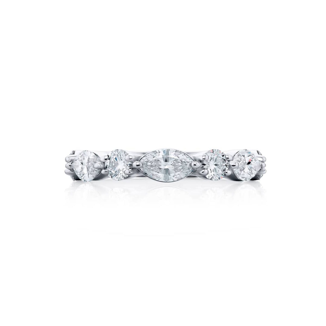Elegance Elevated: Our classic 1.70 ctw. East-West single row Diamond Band. These beautiful marquise diamonds accompany round diamonds and are handcrafted in pure platinum.
