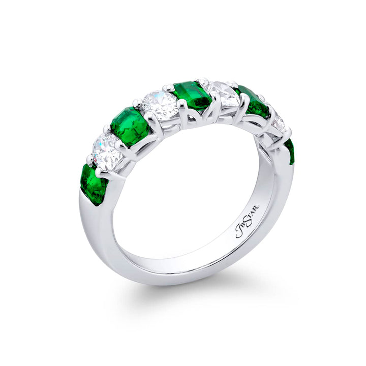 Elegance Elevated: Our classic single row Emerald Band. These beautiful emerald-cut emeralds blended with oval diamonds are handcrafted in pure platinum.