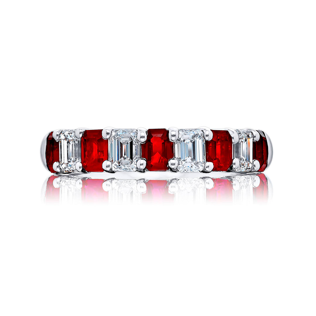 Elegance Elevated: Our classic Ruby and Diamond Band. These beautiful emerald-cut rubies and diamonds are handcrafted in pure platinum.
