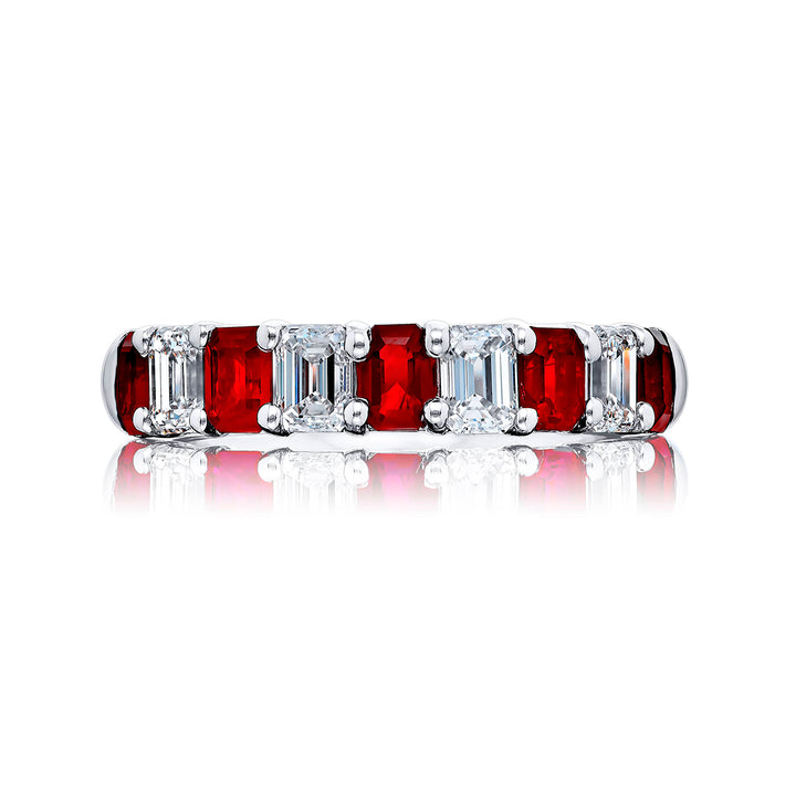 Elegance Elevated: Our classic Ruby and Diamond Band. These beautiful emerald-cut rubies and diamonds are handcrafted in pure platinum.