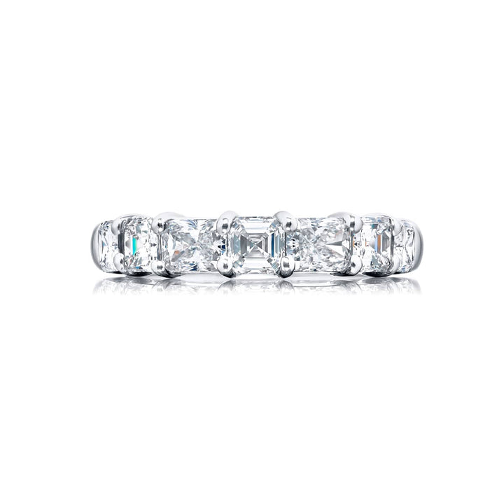 Elegance Elevated: Our classic single row Diamond Band. These stunning square emerald-cut and radiant diamonds are handcrafted in pure platinum.