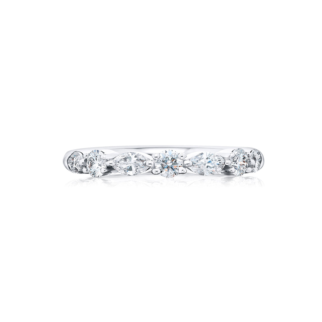 Elegance Elevated: Our classic East-West Diamond Band. These stunning round and marquise diamonds are handcrafted in pure platinum.