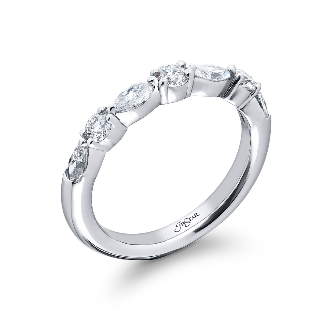 Elegance Elevated: Our classic East-West Diamond Band. These stunning round and marquise diamonds are handcrafted in pure platinum.
