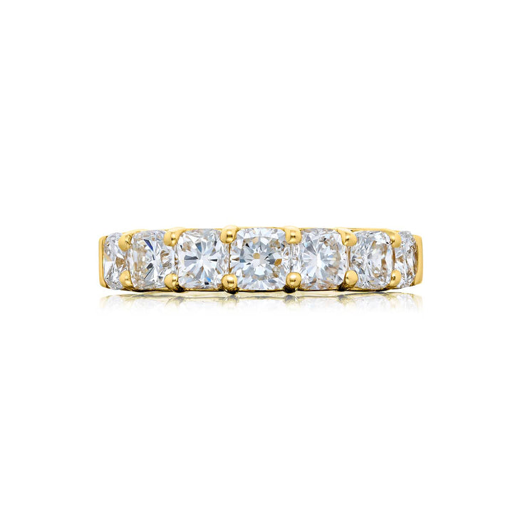 Elegance Elevated: Our stunning 2.56 ctw. Diamond Band. These seven beautiful cushion-cut diamonds are handcrafted in 18KY gold.