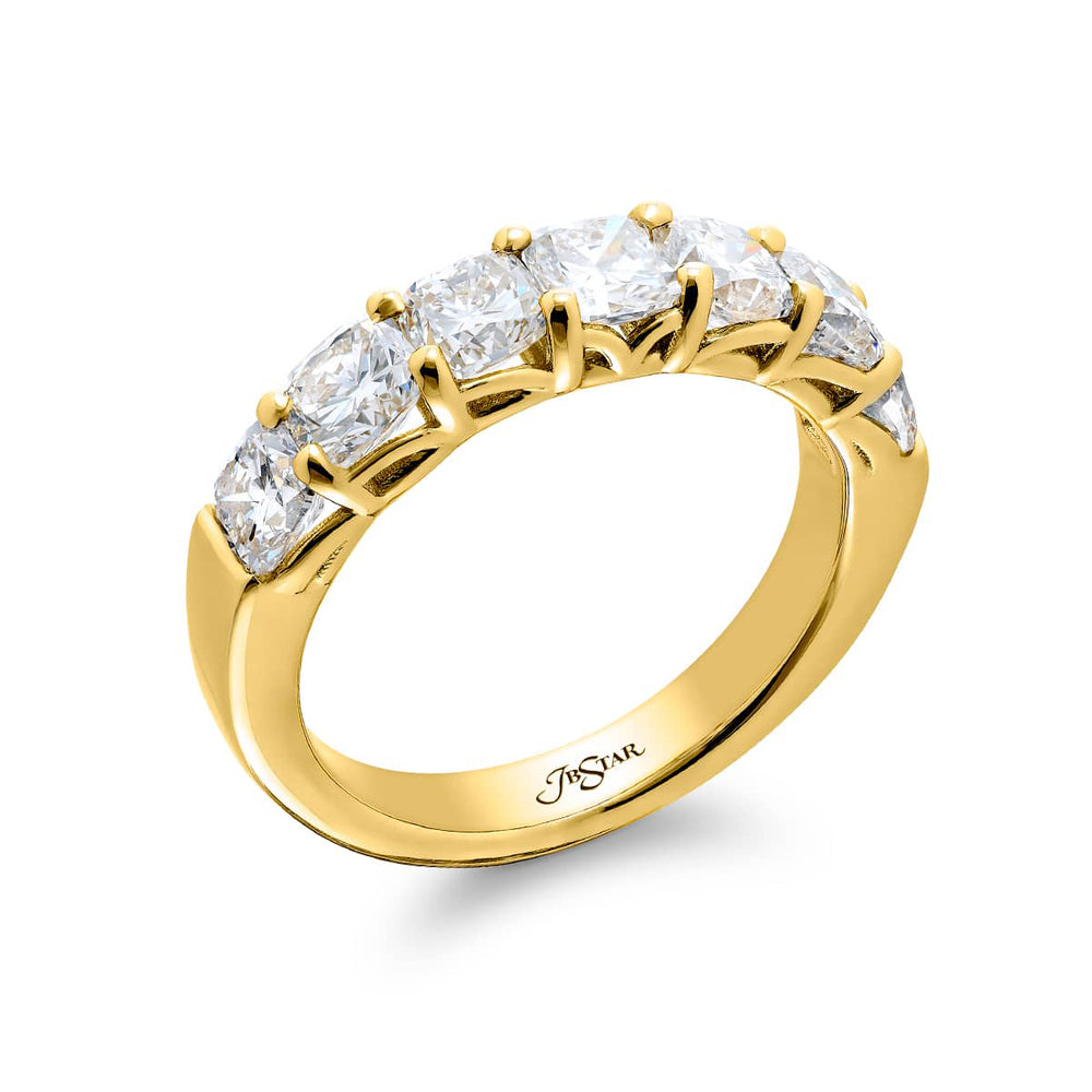 Elegance Elevated: Our stunning 2.56 ctw. Diamond Band. These seven beautiful cushion-cut diamonds are handcrafted in 18KY gold.