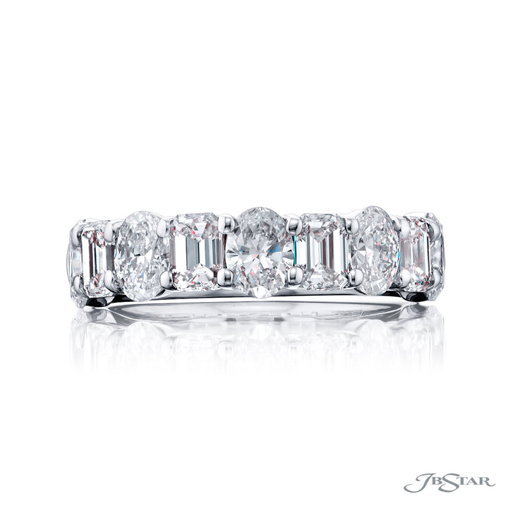 Elegance Elevated: Our classic 2.10 ctw. Diamond Band. These dazzling oval and emerald-cut diamonds are handcrafted in pure platinum.