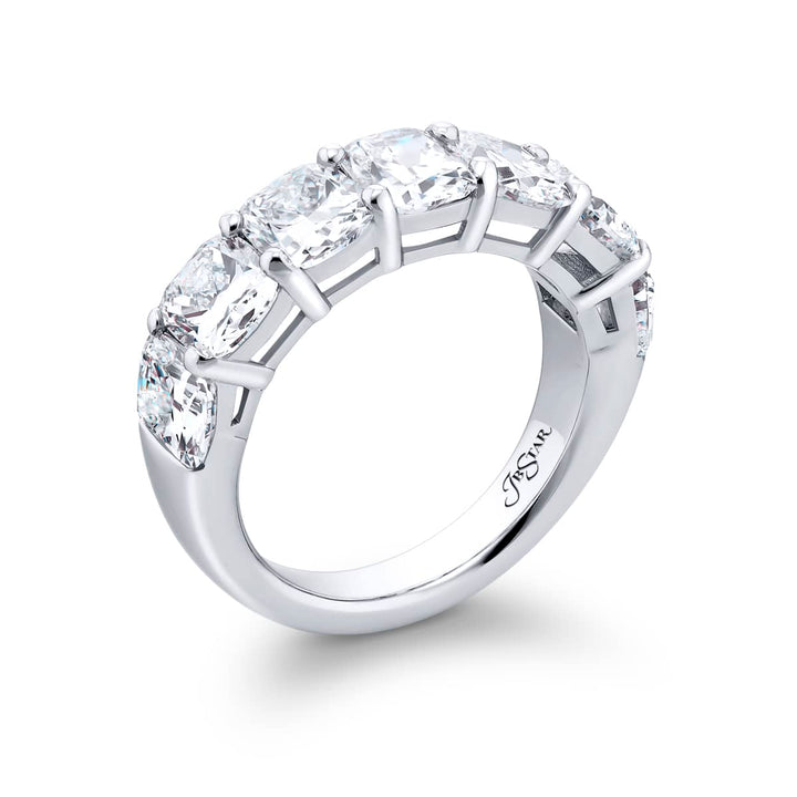 Elegance Elevated: Our stunning 4.96 ctw. GIA certified Diamond Band. These seven beautiful cushion-cut diamonds are handcrafted in pure platinum.