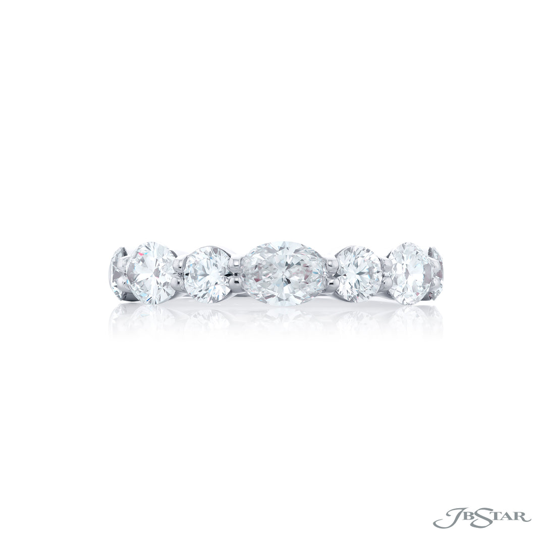 Elegance Elevated: Our classic 1.88 ctw. East-West Diamond Band. These beautiful oval diamonds blended with round diamonds are handcrafted in pure platinum.