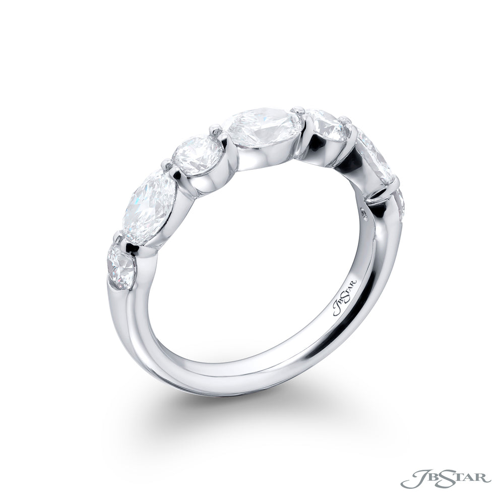 Elegance Elevated: Our classic 1.88 ctw. East-West Diamond Band. These beautiful oval diamonds blended with round diamonds are handcrafted in pure platinum.