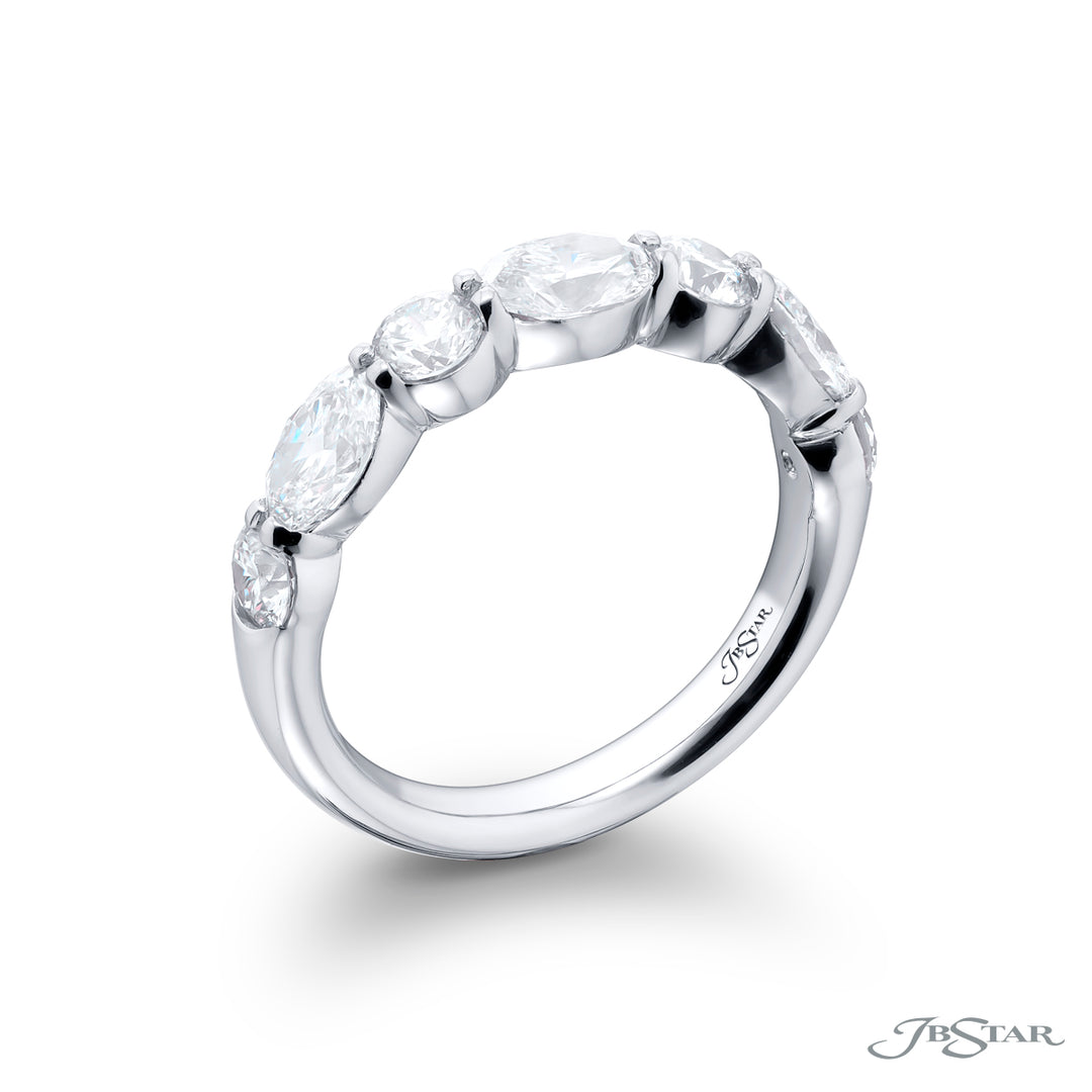 Elegance Elevated: Our classic 1.88 ctw. East-West Diamond Band. These beautiful oval diamonds blended with round diamonds are handcrafted in pure platinum.