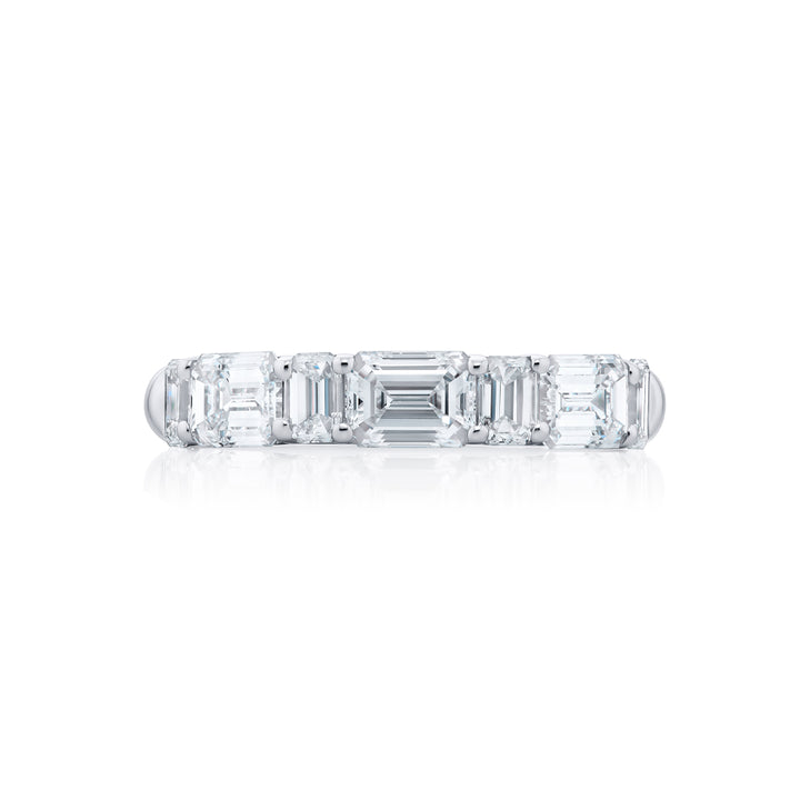 Elegance Elevated: Our stunning 2.10 ctw. East-West Diamond Band. These seven beautiful emerald-cut diamonds are handcrafted in pure platinum.