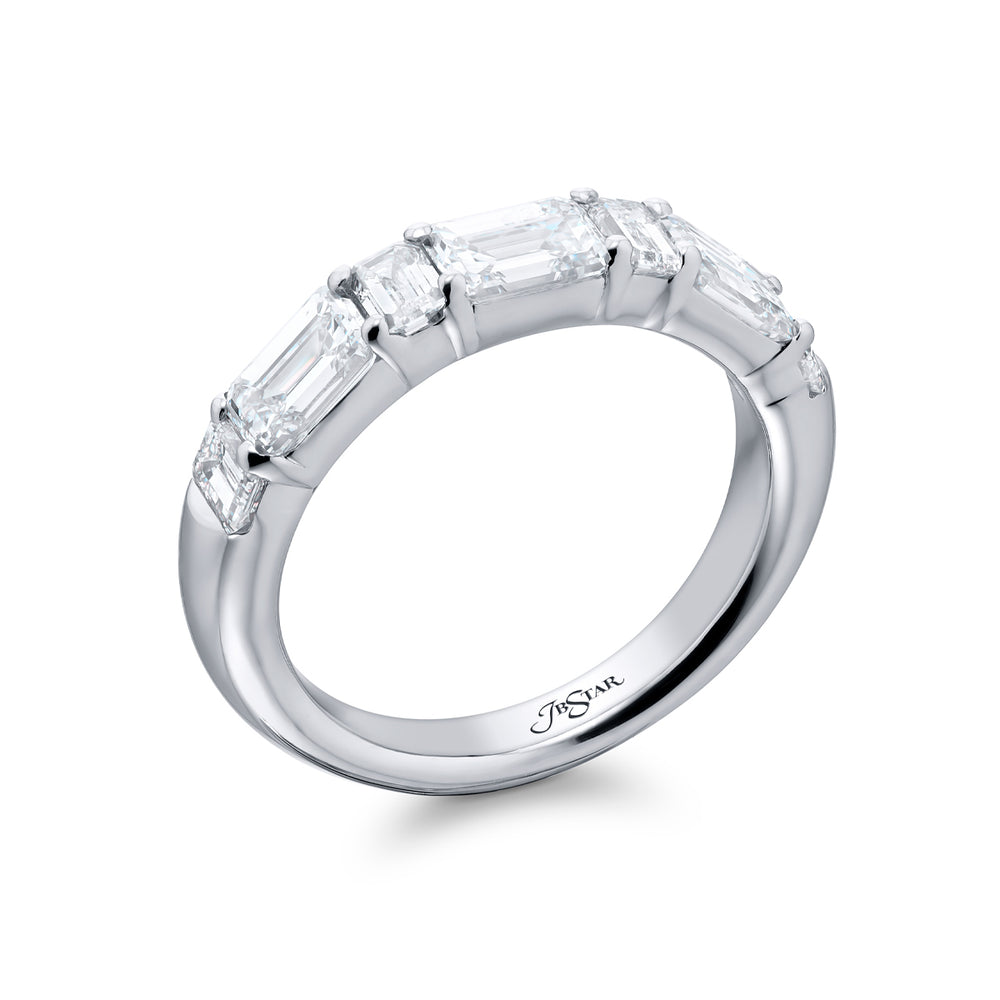 Elegance Elevated: Our stunning 2.10 ctw. East-West Diamond Band. These seven beautiful emerald-cut diamonds are handcrafted in pure platinum.