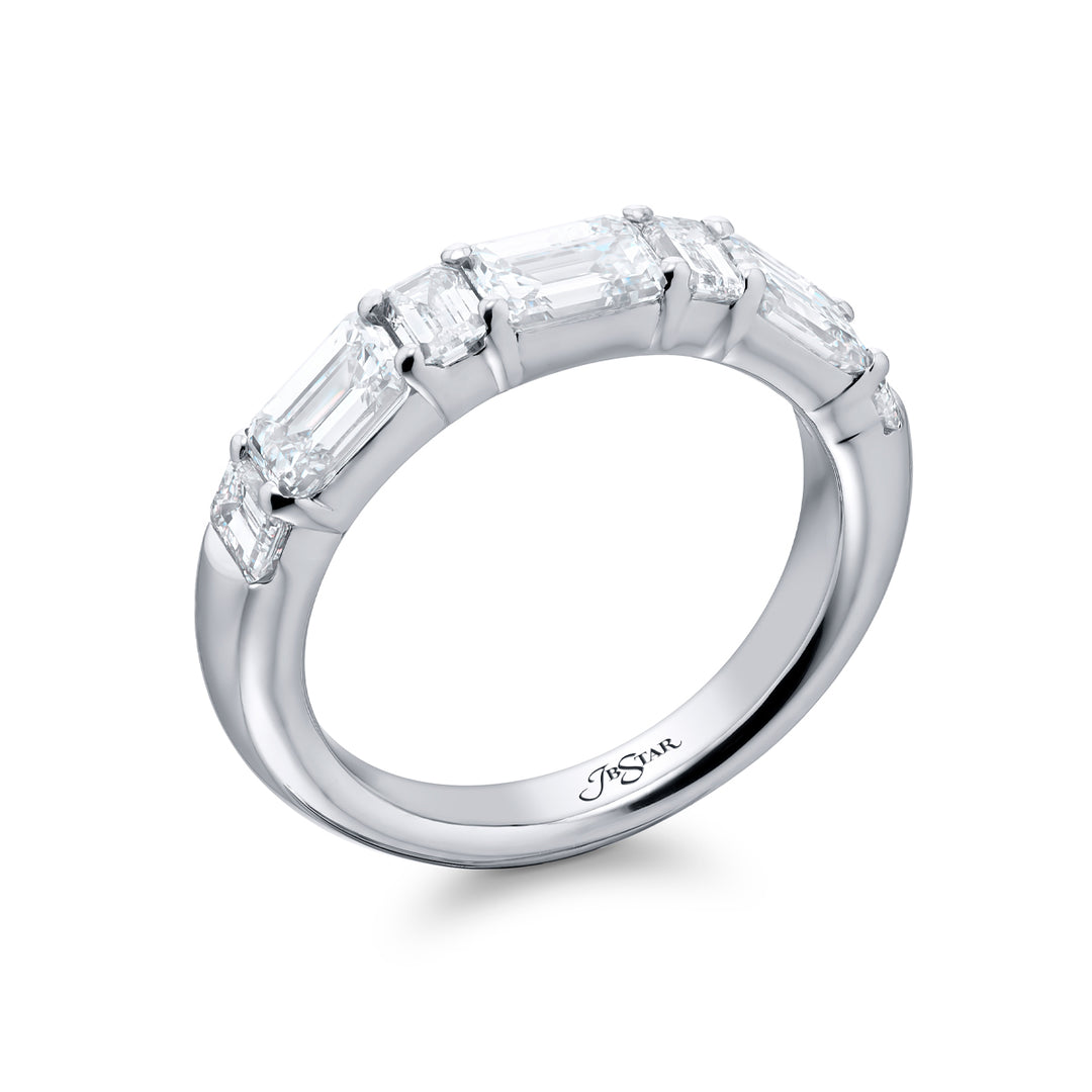 Elegance Elevated: Our stunning 2.10 ctw. East-West Diamond Band. These seven beautiful emerald-cut diamonds are handcrafted in pure platinum.