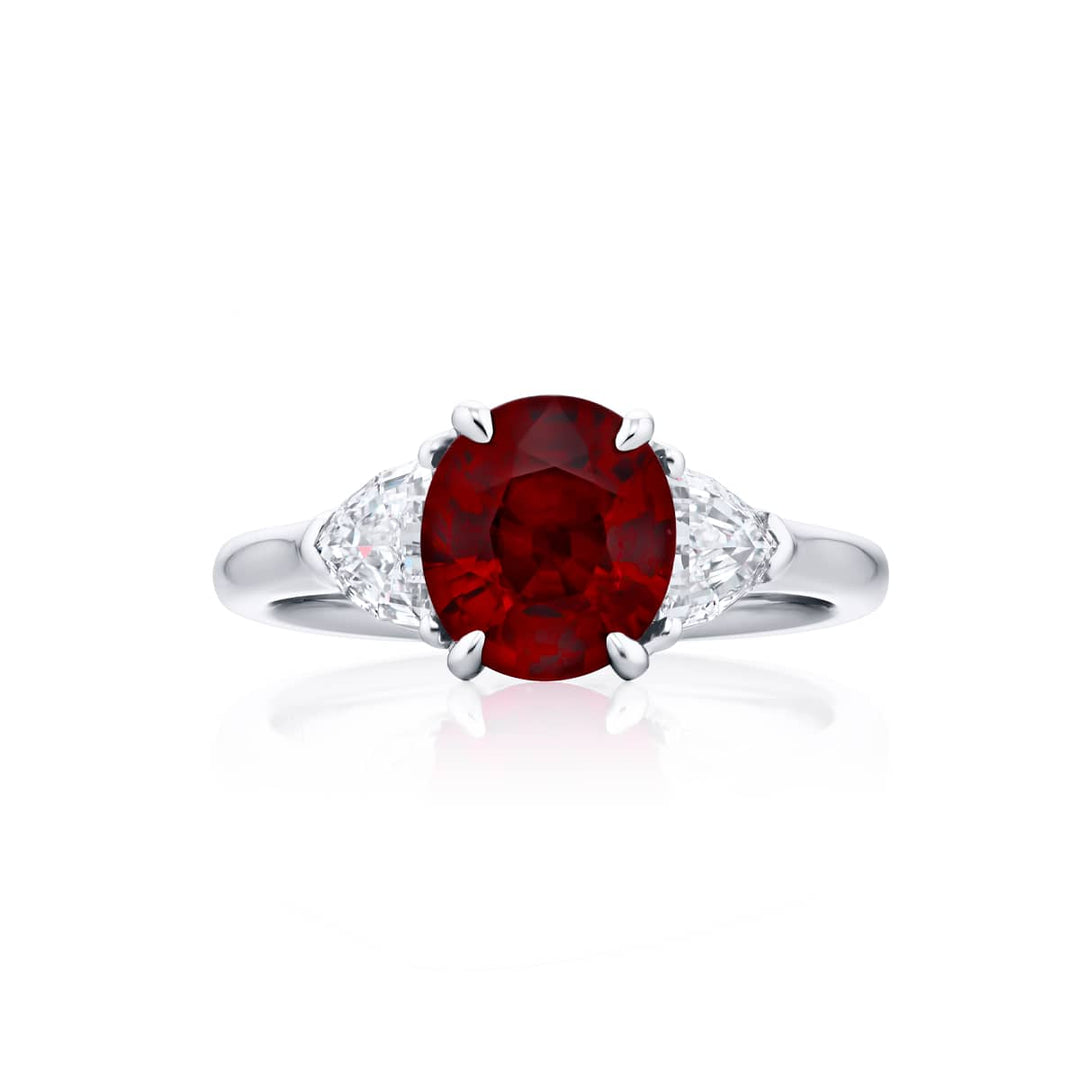 Breathtaking Radiance: Our beautiful 2.08 ct. certified Pigeon?s Blood Ruby Ring. This stunning oval ruby flanked by dazzling epaulette diamonds is handcrafted in pure platinum.