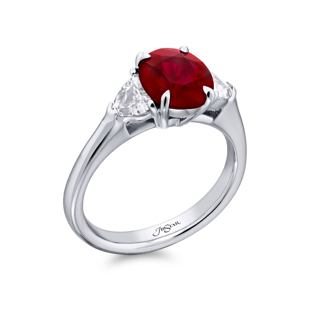 Breathtaking Radiance: Our beautiful 2.08 ct. certified Pigeon?s Blood Ruby Ring. This stunning oval ruby flanked by dazzling epaulette diamonds is handcrafted in pure platinum.