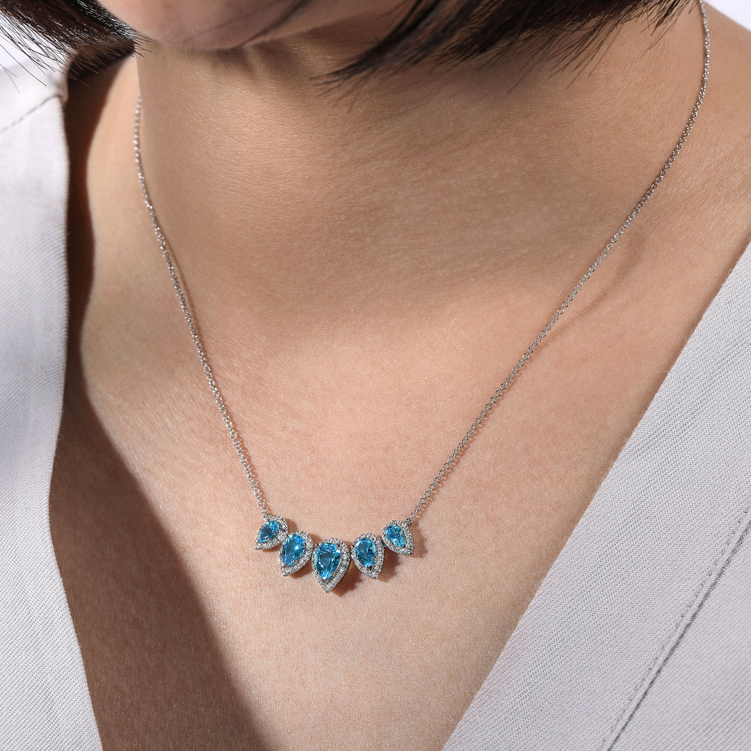 Gabriel & Co. NK6079W45BT Graduating 14K White Gold Pear Shaped Blue Topaz and Diamond Halo Necklace