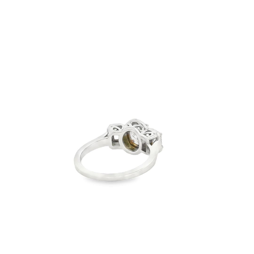Estate Oval Pink Diamond Three-Stone Halo Ring